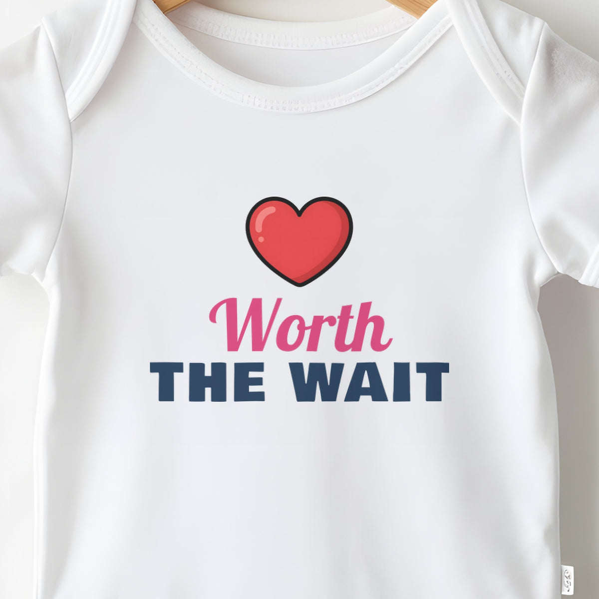 Worth The Wait baby grow print close-up