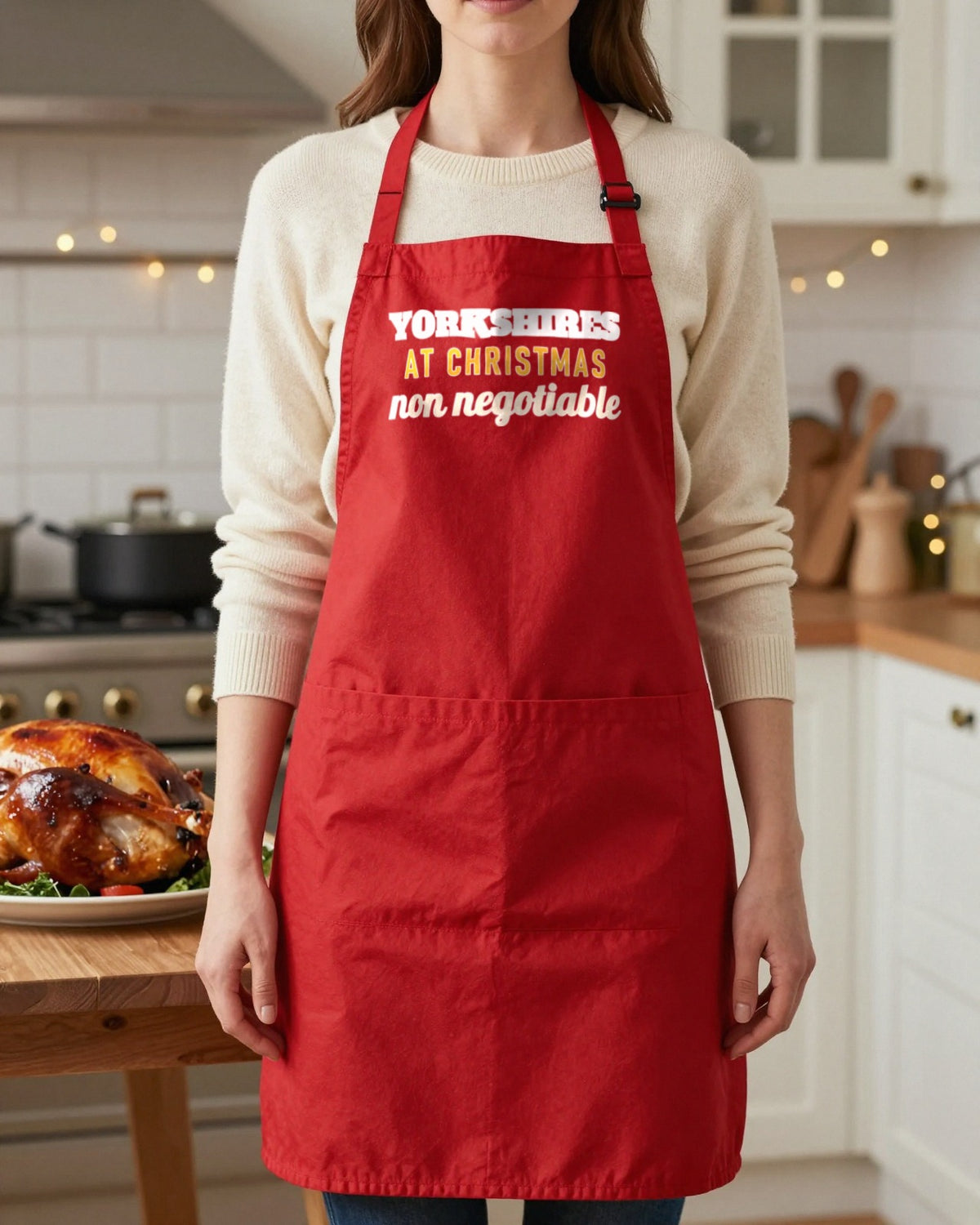Yorkshires At Christmas Non Negotiable Christmas apron in Red, worn, our photo