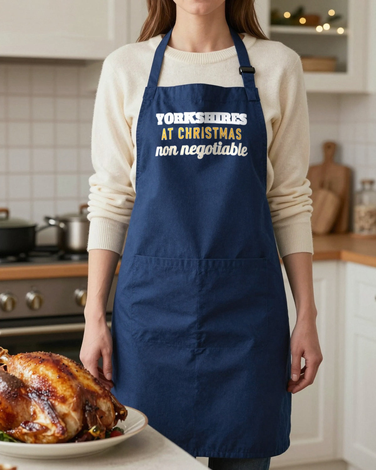 Yorkshires At Christmas Non Negotiable Christmas apron in Navy, worn, our photo