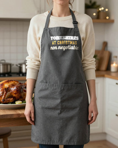 Yorkshires At Christmas Non Negotiable Christmas apron in Dark Grey, worn, our photo